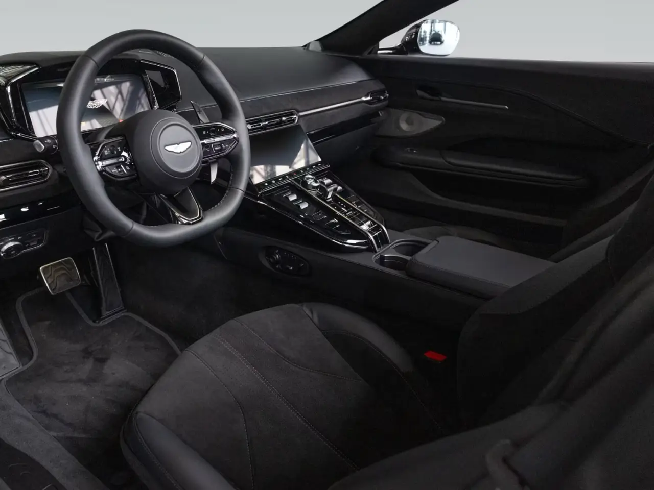 Aston Martin Vantage V8 Spider 2026, front view — Courchevel Luxury Car Rental, Courchevel. The Aston Martin Vantage V8 Spider pairs 665 hp with a roofless cabin built for two, and…