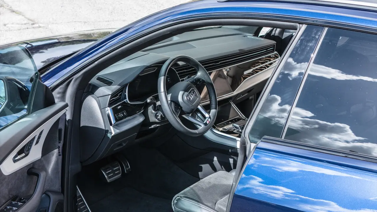 Audi Q8 55 TFSI 2022, interior — Courchevel Luxury Car Rental, Courchevel. The Audi Q8 55 TFSI pairs 340 hp with quattro all-wheel drive and a cabin that seats five…