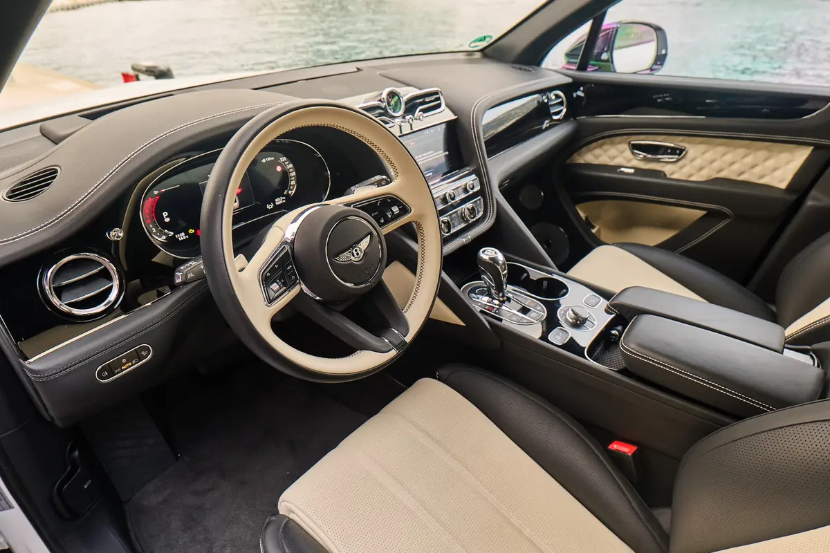 Bentley Bentayga V8-S 2024, rear view — Courchevel Luxury Car Rental, Courchevel. The Bentayga V8-S pairs a 550 hp V8 with the cabin space and ride quality that a…