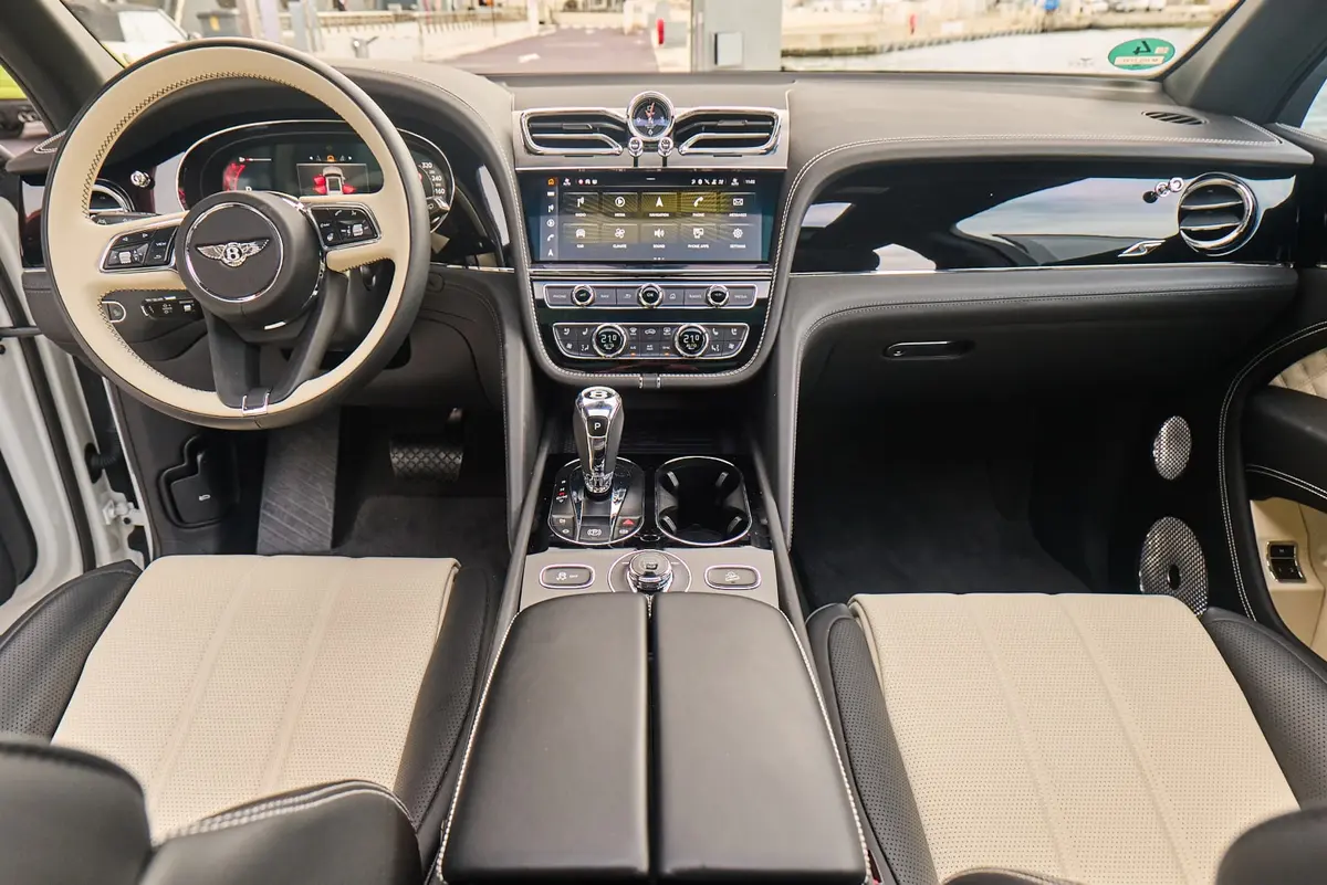 Bentley Bentayga V8-S 2024, dashboard — Courchevel Luxury Car Rental, Courchevel. The Bentayga V8-S pairs a 550 hp V8 with the cabin space and ride quality that a…