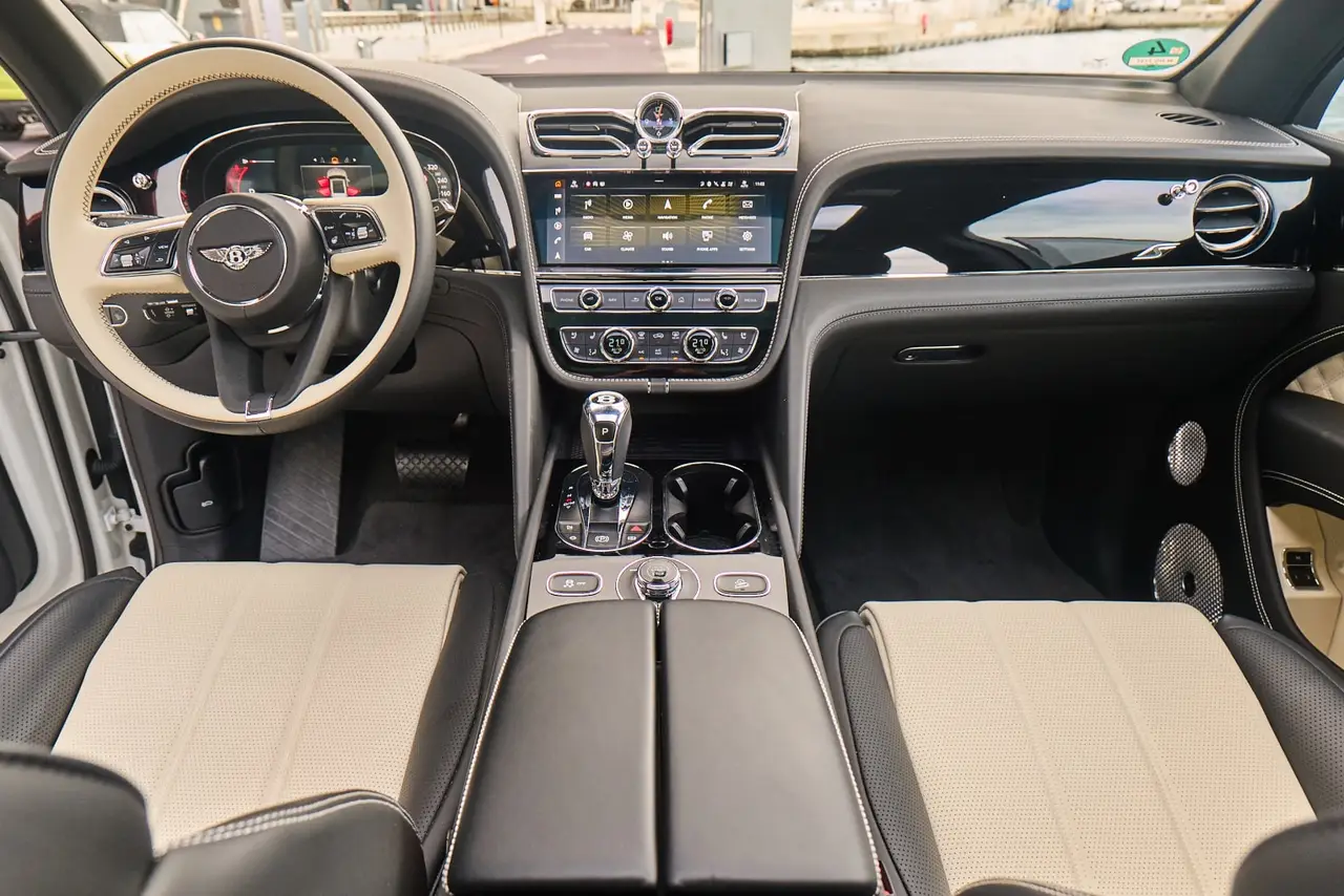Bentley Bentayga V8-S 2024, dashboard — Courchevel Luxury Car Rental, Courchevel. The Bentayga V8-S pairs a 550 hp V8 with the cabin space and ride quality that a…
