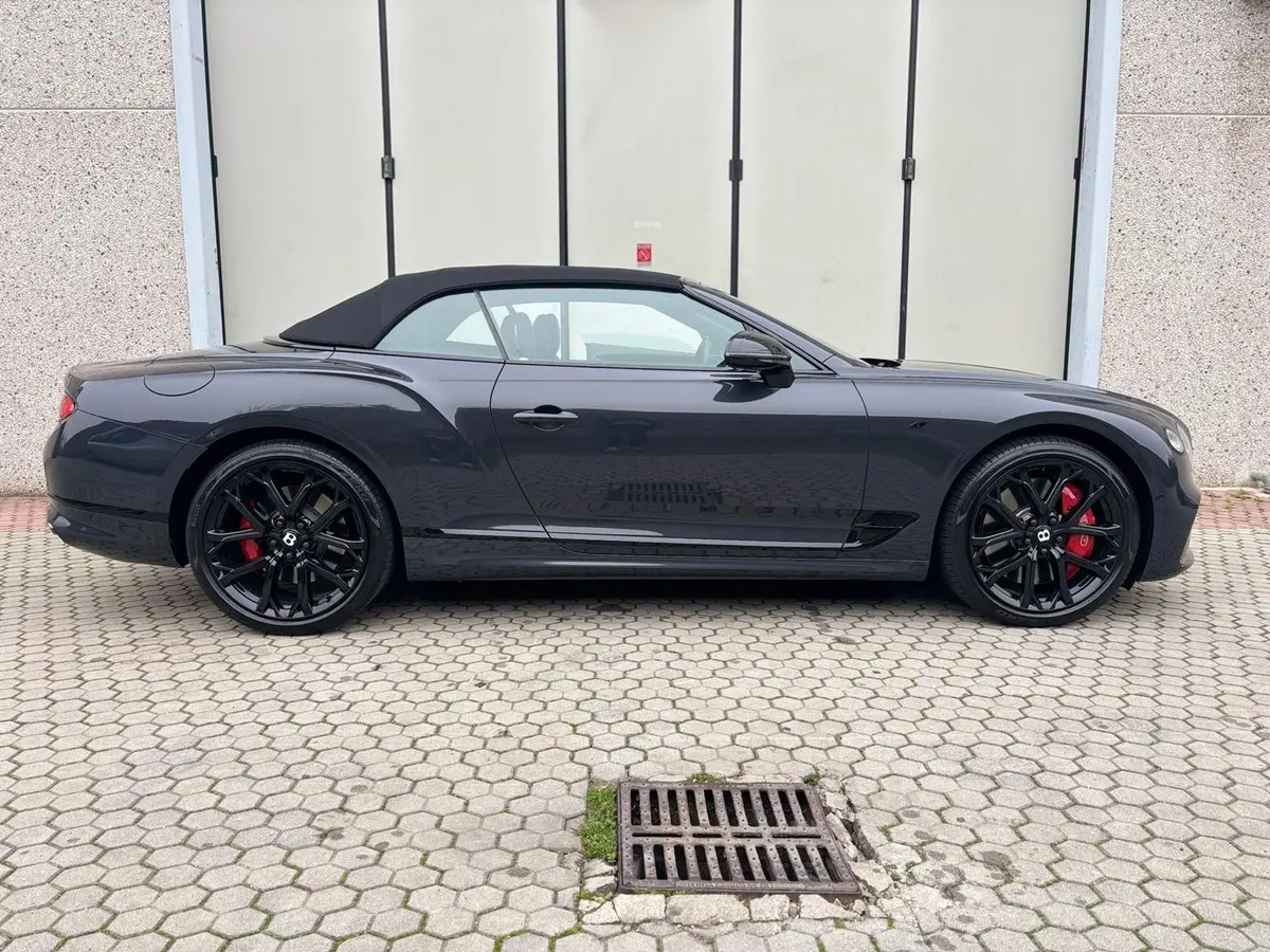 Bentley Continental GTC S V8 2025, rear view — Courchevel Luxury Car Rental, Courchevel. The 2025 Bentley Continental GTC S V8 pairs a 550 hp twin-turbo V8 with a full four-seat…