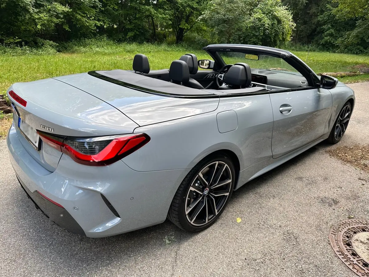BMW 430i Cabrio 2023, exterior — Courchevel Luxury Car Rental, Courchevel. The BMW 430i Cabrio brings 245 hp and four seats to a fleet otherwise weighted toward…