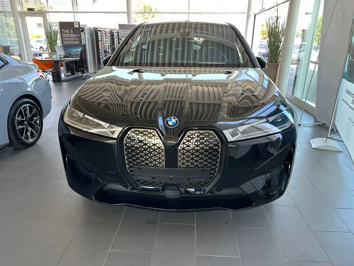 BMW IX M60 2023, front view — Courchevel Luxury Car Rental, Courchevel. The BMW iX M60 pairs 619 hp with a fully electric drivetrain, giving it a wide, immediate…