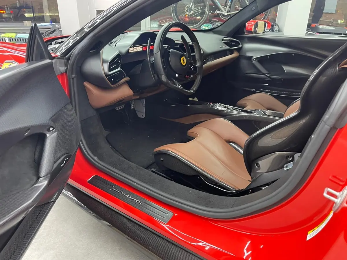 Ferrari 296 GTB 2023, front view — Courchevel Luxury Car Rental, Courchevel. The Ferrari 296 GTB pairs a mid-engine chassis with 830 hp, and on the open sweeps toward…
