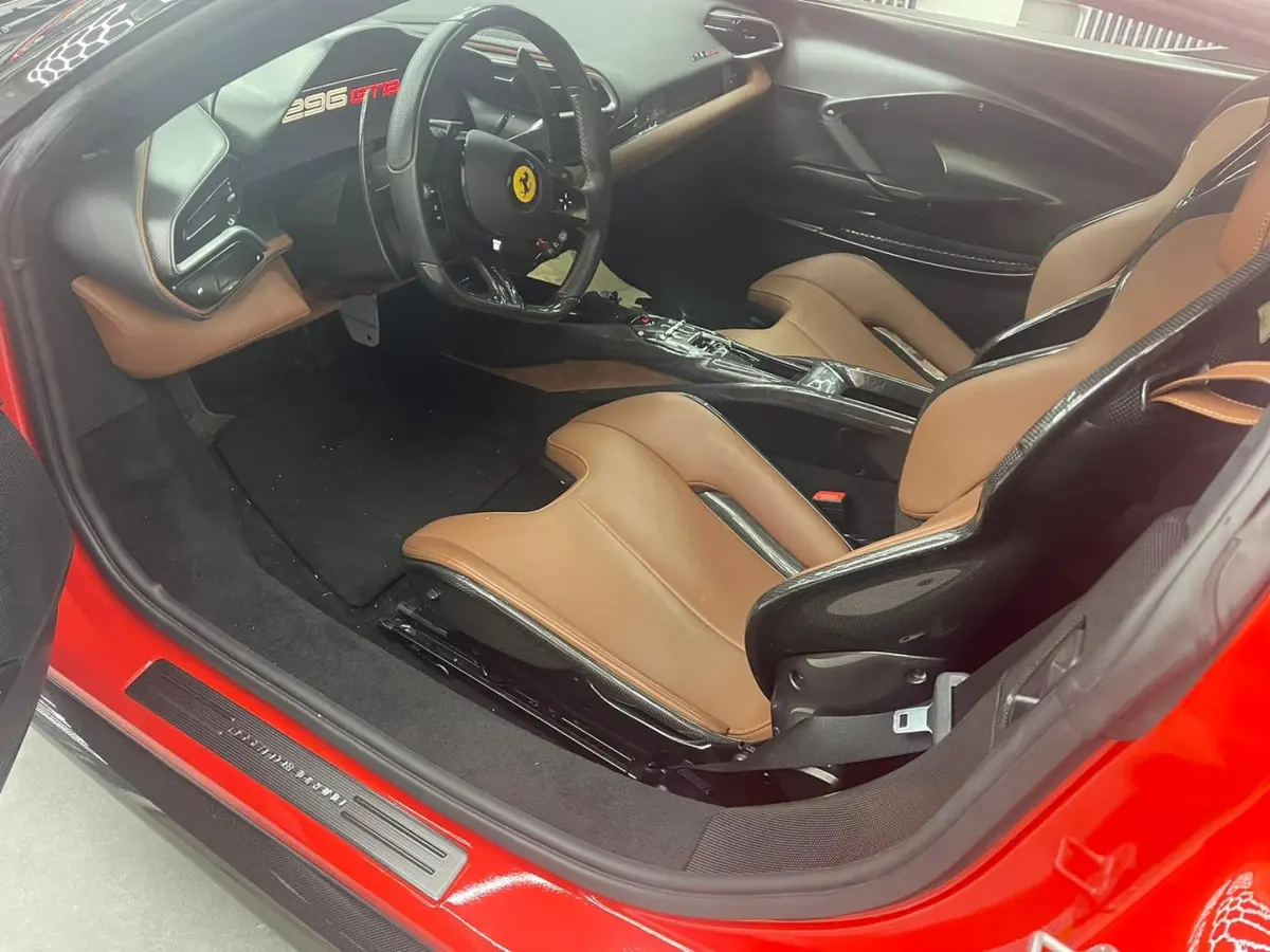 Ferrari 296 GTB 2023, dashboard — Courchevel Luxury Car Rental, Courchevel. The Ferrari 296 GTB pairs a mid-engine chassis with 830 hp, and on the open sweeps toward…