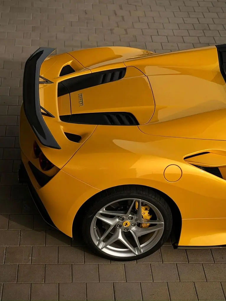 Ferrari F8 SPIDER 2023, exterior — Courchevel Luxury Car Rental, Courchevel. The Ferrari F8 Spider pairs a twin-turbo V8 with 720 hp to a folding hard top, giving…