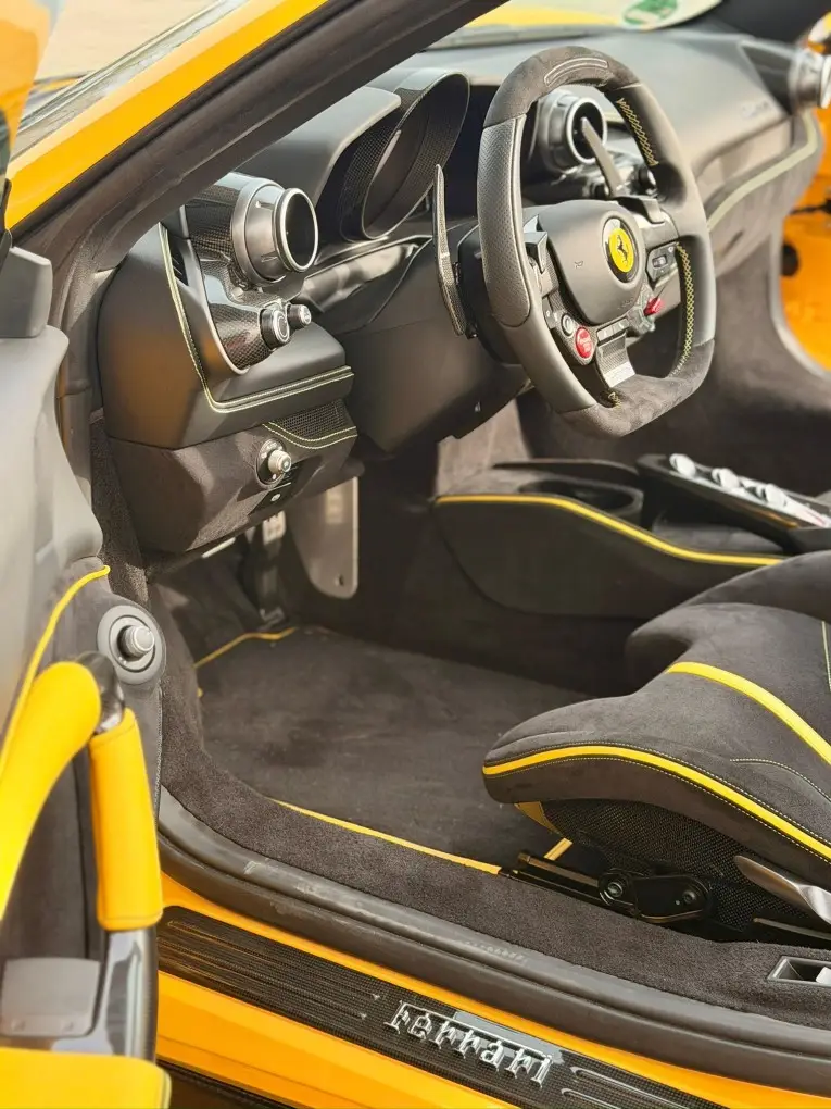 Ferrari F8 SPIDER 2023, interior — Courchevel Luxury Car Rental, Courchevel. The Ferrari F8 Spider pairs a twin-turbo V8 with 720 hp to a folding hard top, giving…