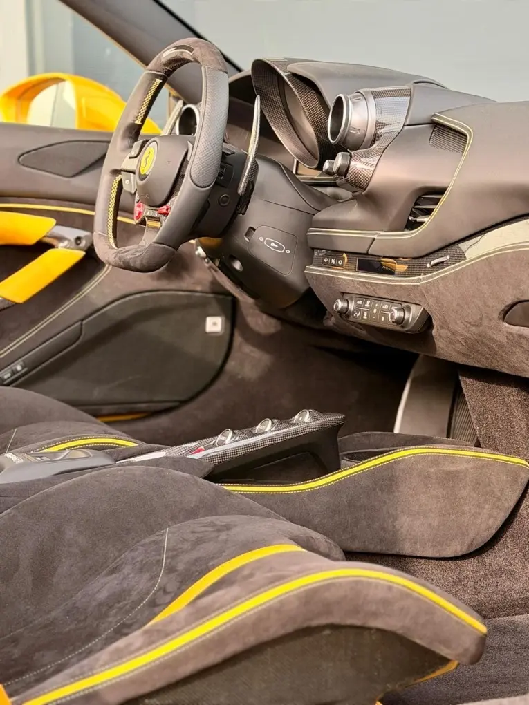 Ferrari F8 SPIDER 2023, dashboard — Courchevel Luxury Car Rental, Courchevel. The Ferrari F8 Spider pairs a twin-turbo V8 with 720 hp to a folding hard top, giving…