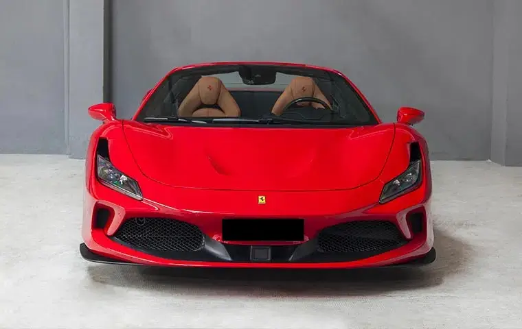 Ferrari F8 Tributo Spider Red 2023, front view — Courchevel Luxury Car Rental, Courchevel. The Ferrari F8 Tributo Spider pairs a 720 hp twin-turbo V8 with a two-seat cockpit and…