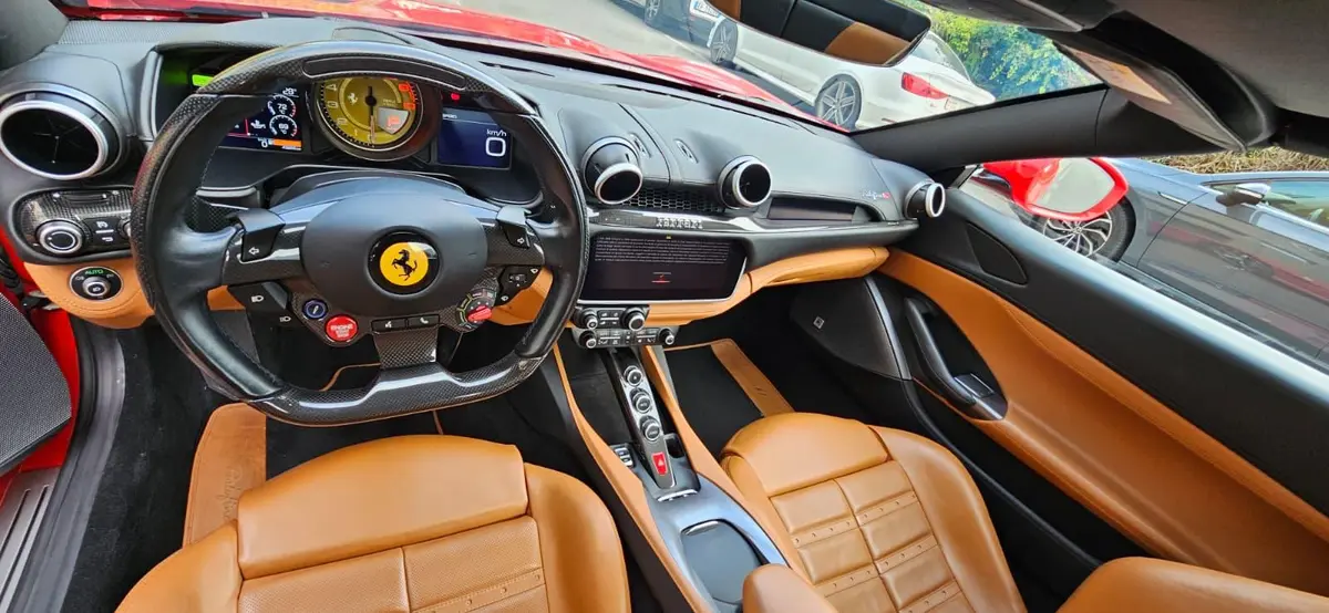 Ferrari Portofino M 2023, front view — Courchevel Luxury Car Rental, Courchevel. The Ferrari Portofino M pairs a 620 hp V8 with real usability: four seats, a retractable…