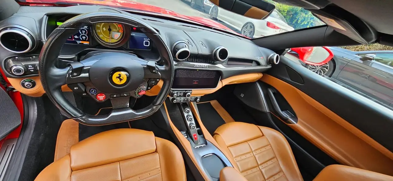 Ferrari Portofino M 2023, front view — Courchevel Luxury Car Rental, Courchevel. The Ferrari Portofino M pairs a 620 hp V8 with real usability: four seats, a retractable…