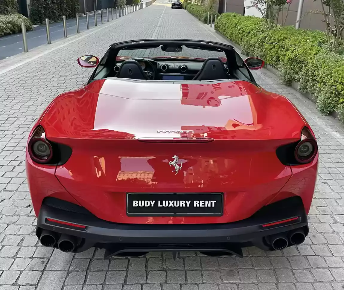 Ferrari Portofino M 2023, side profile — Courchevel Luxury Car Rental, Courchevel. The Ferrari Portofino M pairs a 620 hp V8 with real usability: four seats, a retractable…