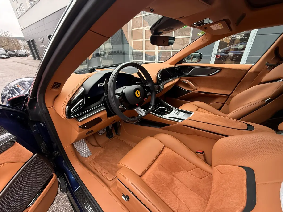 Ferrari Purosangue 2024, rear view — Courchevel Luxury Car Rental, Courchevel. The Purosangue is Ferrari's answer to a genuine contradiction: five real seats and 715 hp…