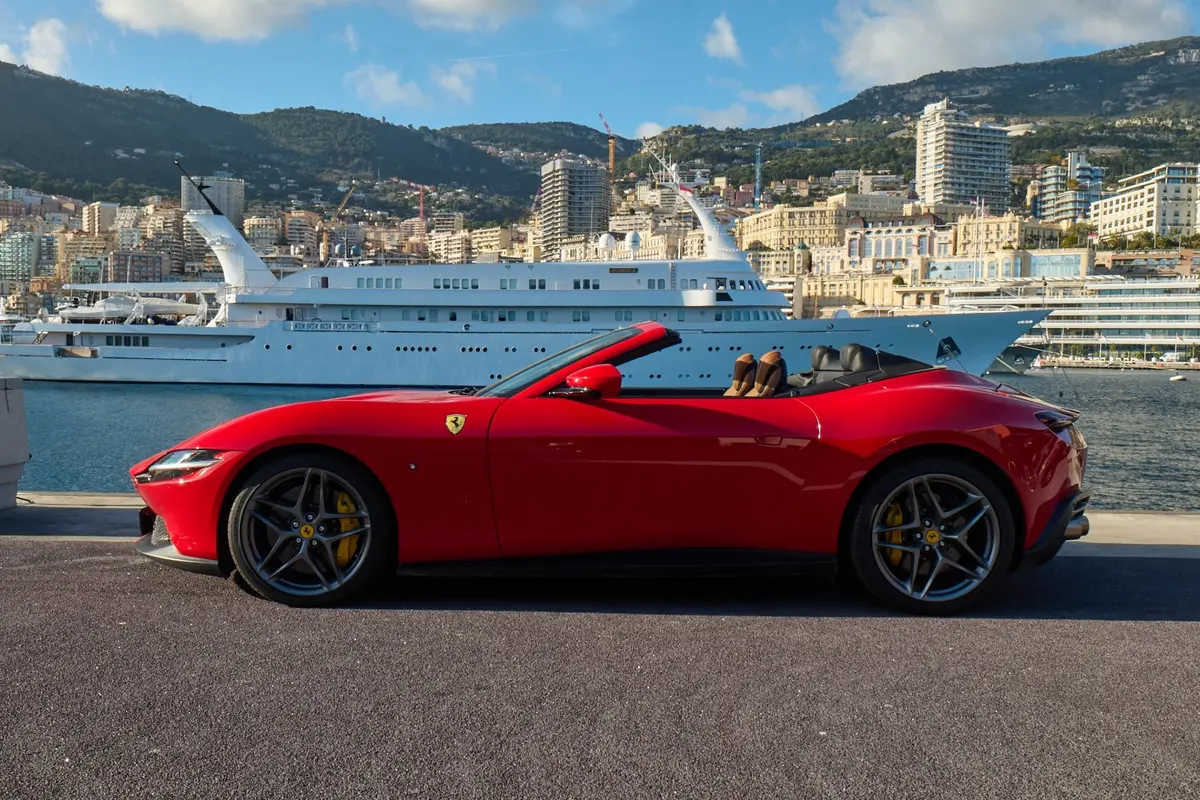 Ferrari Roma Spider 2024, exterior — Courchevel Luxury Car Rental, Courchevel. The Ferrari Roma Spider carries its 620 hp with the manners of a grand tourer rather than…
