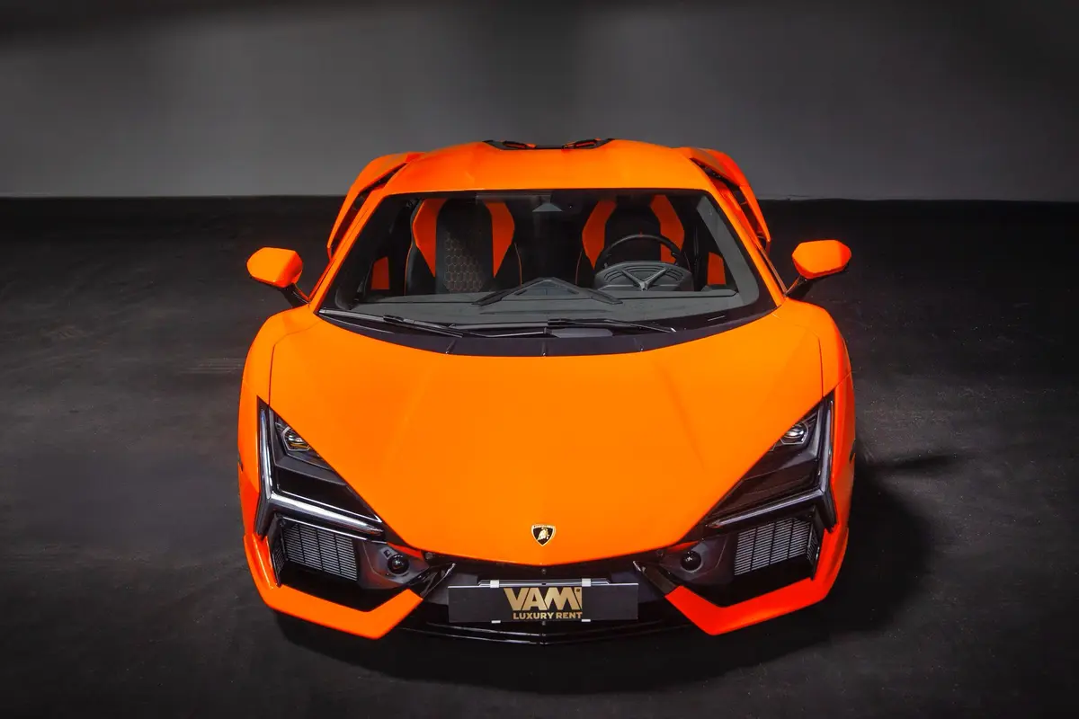 Lamborghini Revuelto 2026, rear view — Courchevel Luxury Car Rental, Courchevel. The 2026 Lamborghini Revuelto brings 1015 hp to a two-seat cockpit built for a driver who…