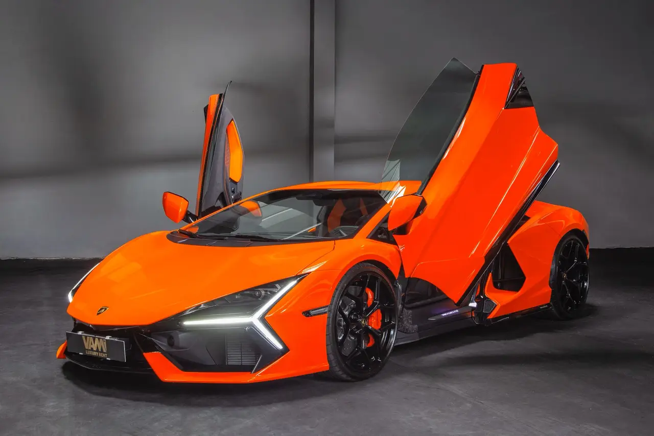 Lamborghini Revuelto 2026, side profile — Courchevel Luxury Car Rental, Courchevel. The 2026 Lamborghini Revuelto brings 1015 hp to a two-seat cockpit built for a driver who…