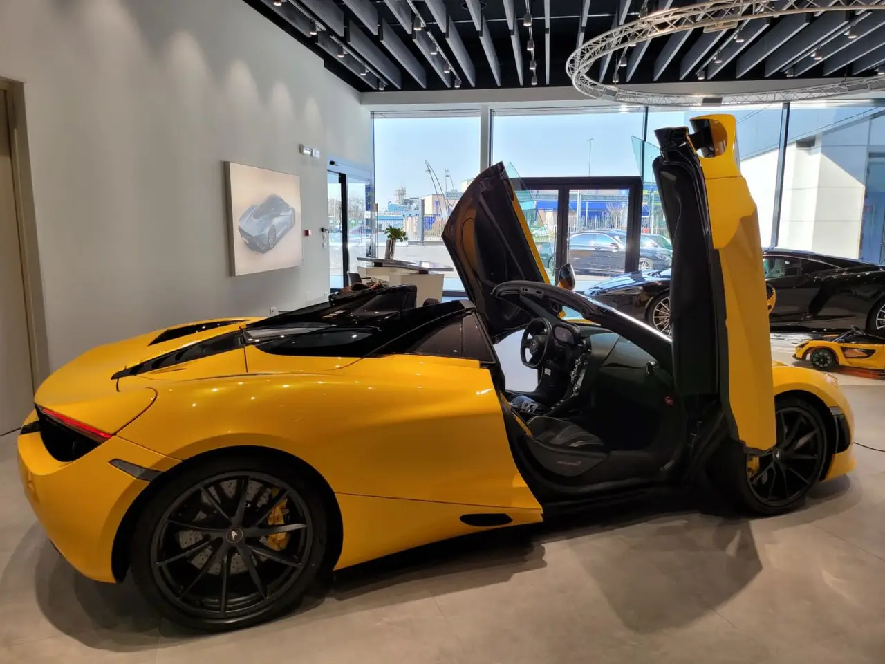 McLaren 720S Spider 2022, front view — Courchevel Luxury Car Rental, Courchevel. The McLaren 720S Spider brings 720 hp to a two-seat cockpit built around a carbon…