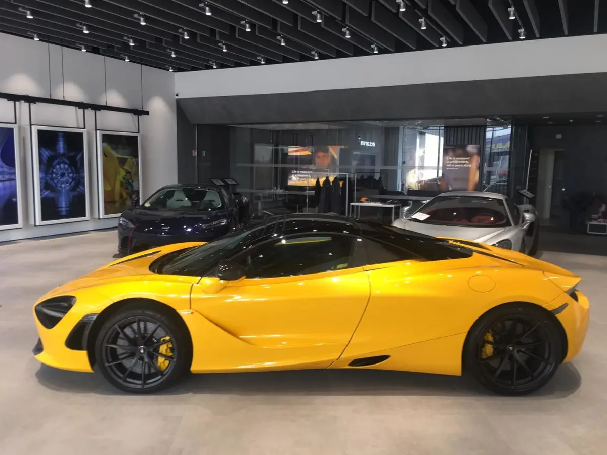 McLaren 720S Spider 2022, rear view — Courchevel Luxury Car Rental, Courchevel. The McLaren 720S Spider brings 720 hp to a two-seat cockpit built around a carbon…