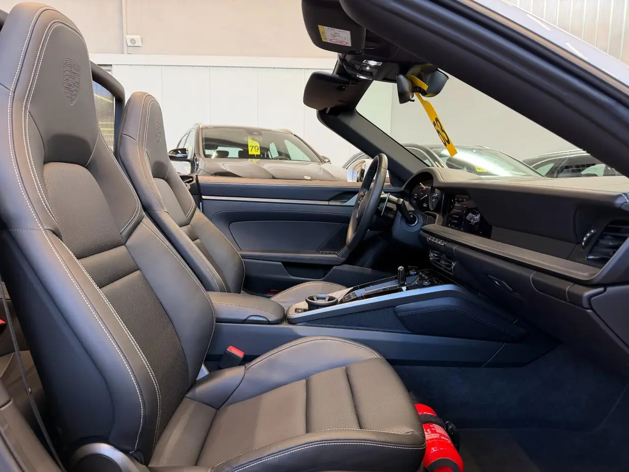Porsche 911 Carrera S Cabrio (992) 2025, exterior — Courchevel Luxury Car Rental, Courchevel. The 2025 Porsche 911 Carrera S Cabrio (992) pairs 480 hp with the kind of steering…