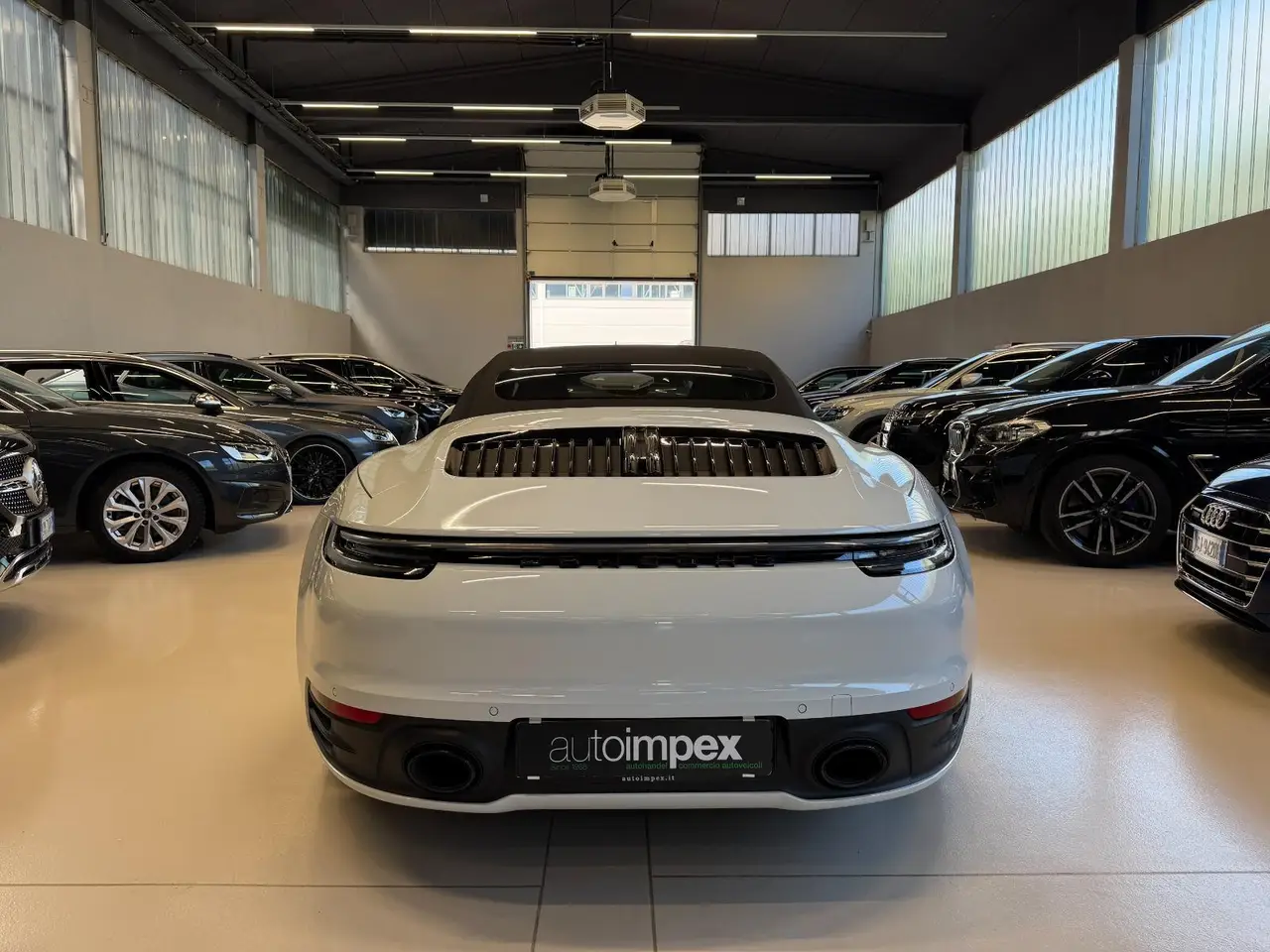 Porsche 911 Carrera S Cabrio (992) 2025, exterior — Courchevel Luxury Car Rental, Courchevel. The 2025 Porsche 911 Carrera S Cabrio (992) pairs 480 hp with the kind of steering…