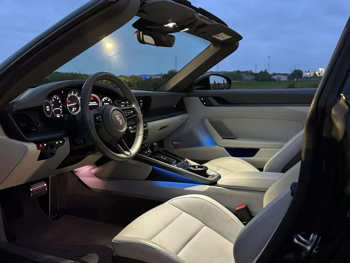 Porsche 911 Targa 2025, rear view — Courchevel Luxury Car Rental, Courchevel. The 2025 Porsche 911 Targa pairs 541 hp with the model's signature roll hoop and…