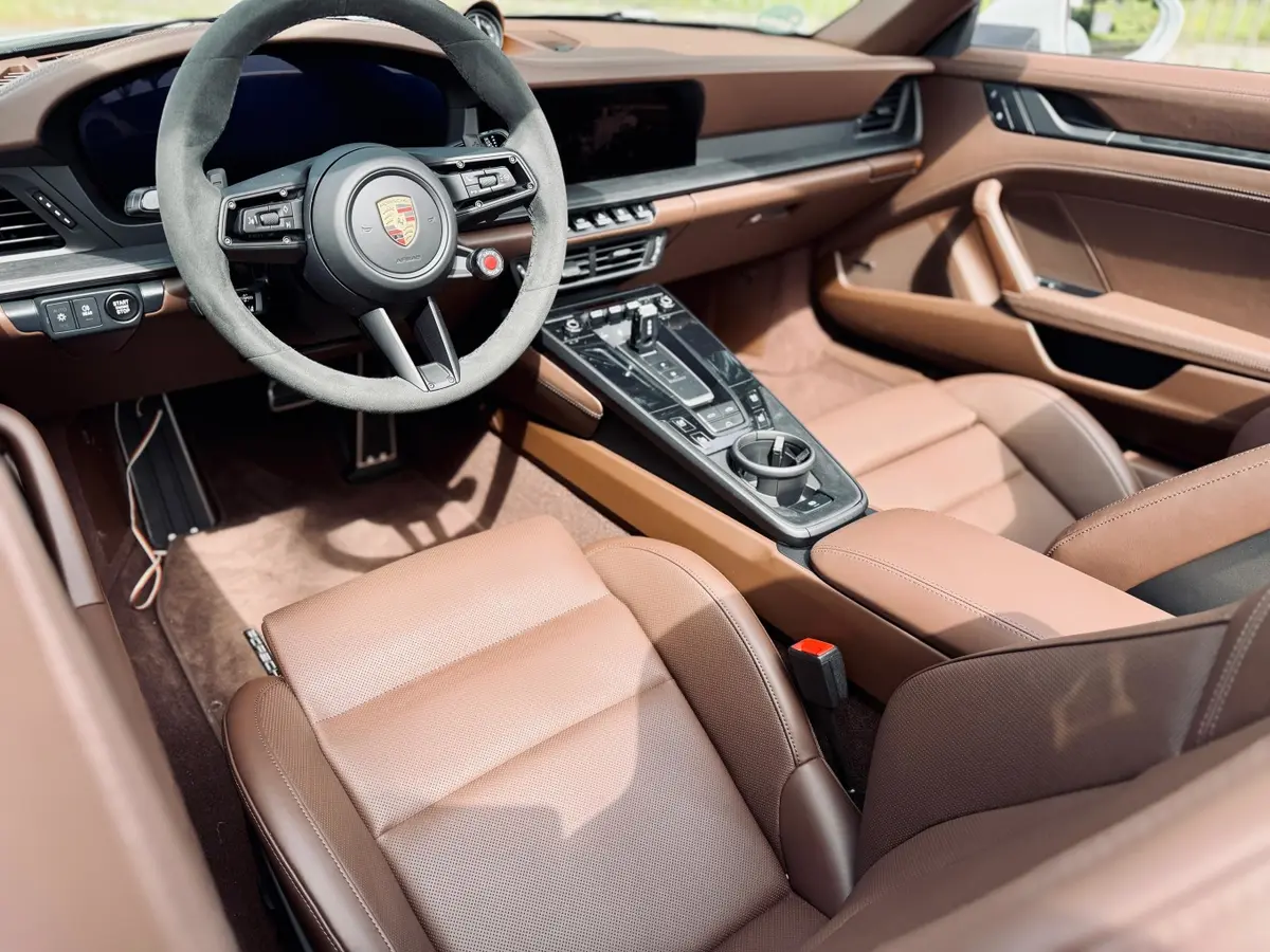 Porsche 992.2 Carrera 4 GTS Cabrio 2025, dashboard — Courchevel Luxury Car Rental, Courchevel. The Porsche 992.2 Carrera 4 GTS Cabrio pairs 540 hp with all-wheel drive, a combination…