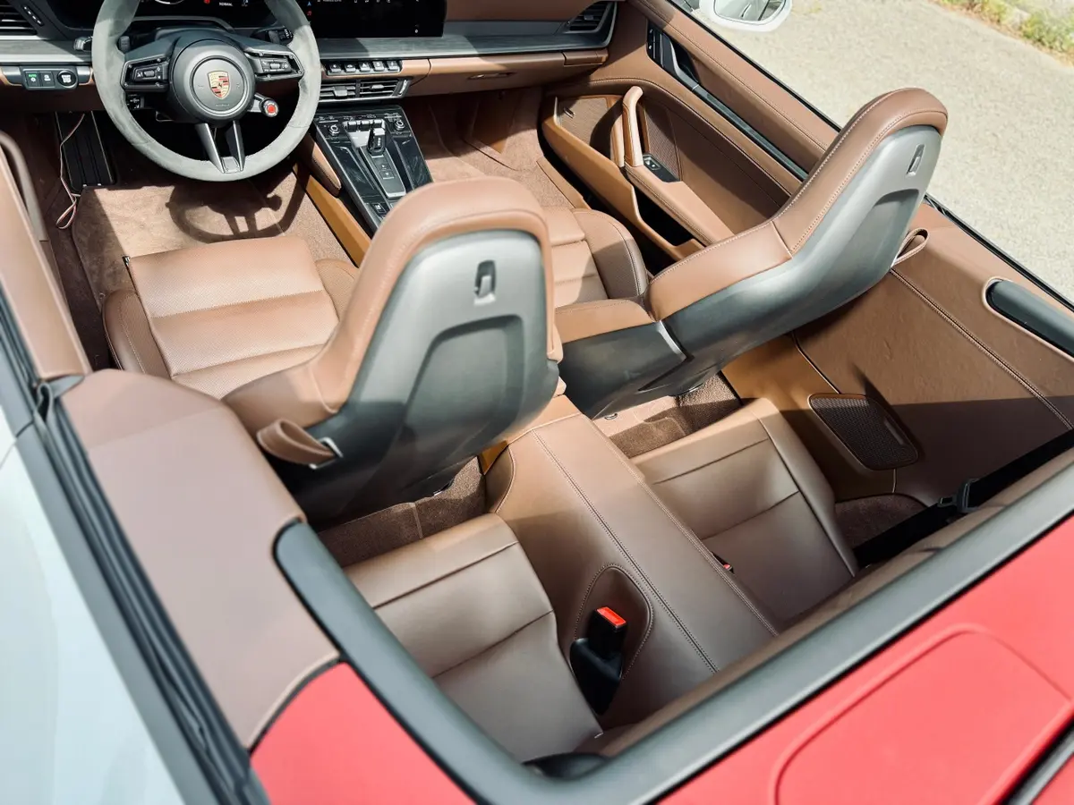 Porsche 992.2 Carrera 4 GTS Cabrio 2025, side profile — Courchevel Luxury Car Rental, Courchevel. The Porsche 992.2 Carrera 4 GTS Cabrio pairs 540 hp with all-wheel drive, a combination…