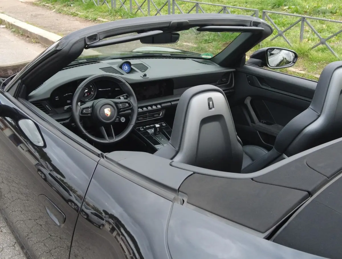 Porsche 992 Carrera 4 GTS Cabrio 2024, interior — Courchevel Luxury Car Rental, Courchevel. The 2024 Porsche 992 Carrera 4 GTS Cabrio pairs 480 hp with all-wheel drive, a…