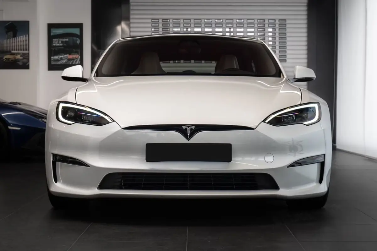 Tesla Model S Plaid 2025, side profile — Courchevel Luxury Car Rental, Courchevel. The 2025 Tesla Model S Plaid brings 1020 hp to a car that seats five without asking…